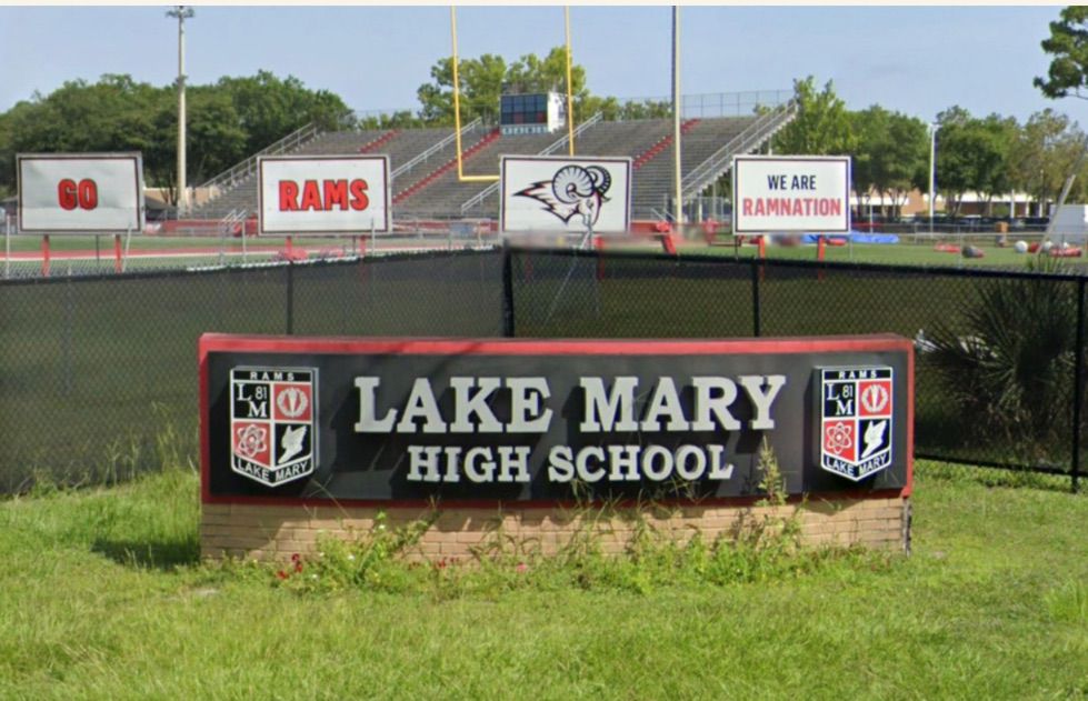 Lake Mary High School entrance sign and We Are Ramnation banners